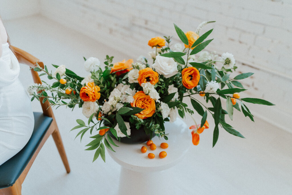 orange bridal bouquet with kumquats